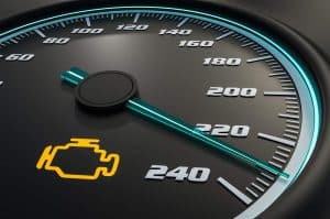 Amber Check Engine Light is activate on a car dashboard
